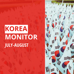 The text "Korea Monitor July-August" on a red background, with a large number of small South Korean flags next to it