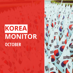 The text "Korean Monitor October" on a red background, with a large number of small South Korean flags next to it.