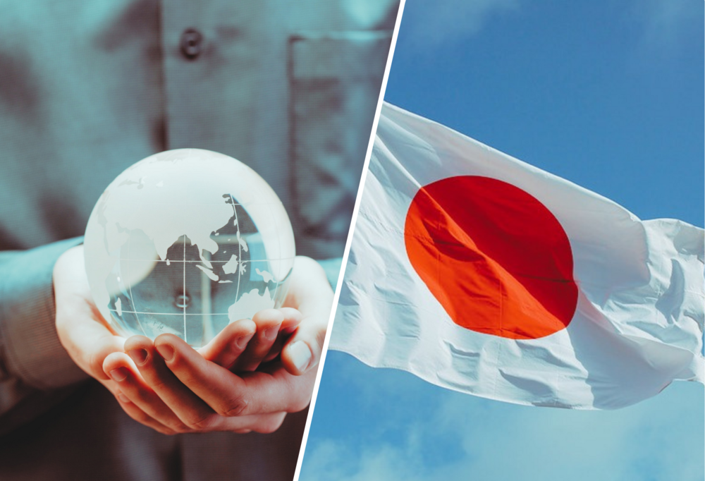 Planeta Ziemia w złożonych rękach i flaga Japonii